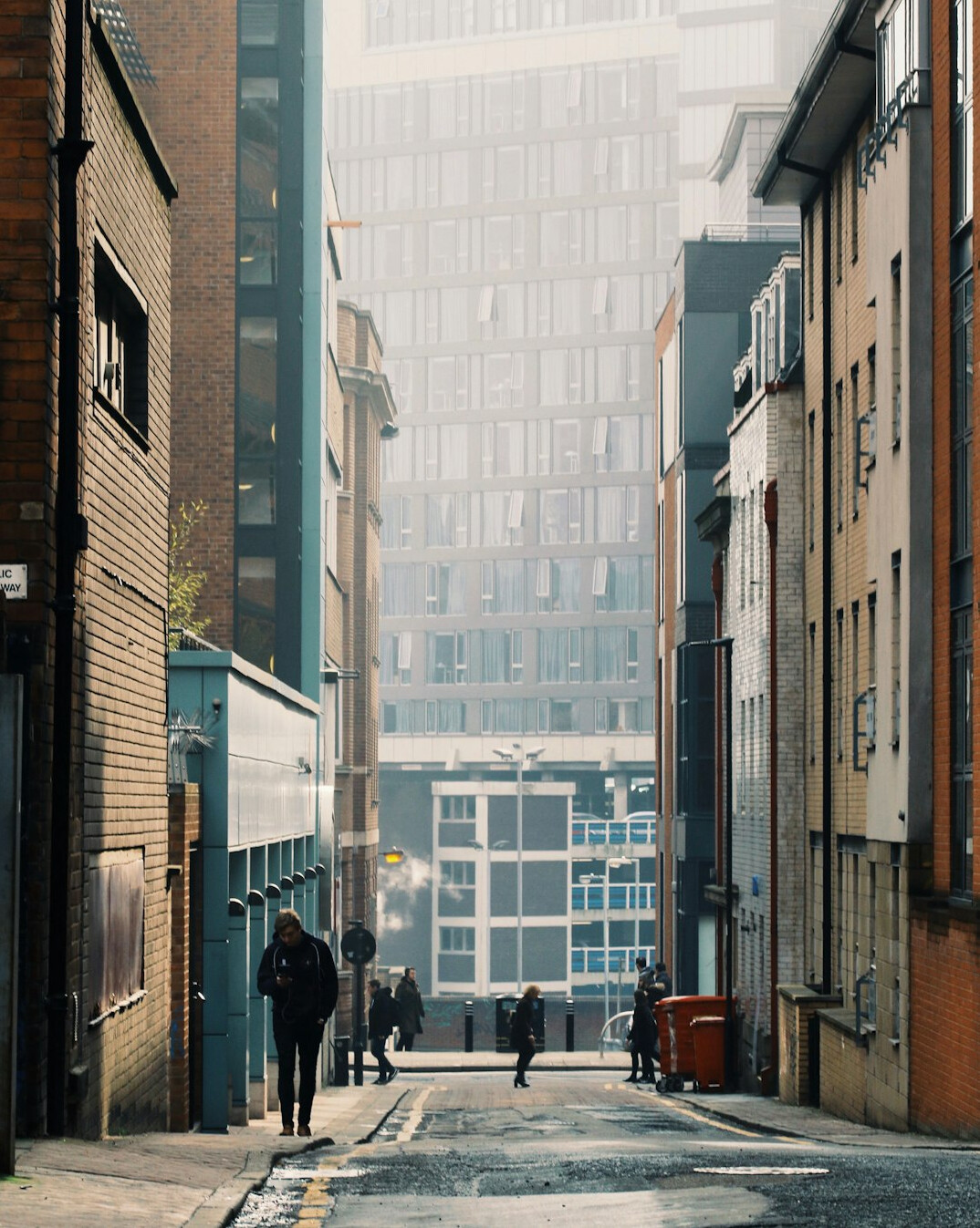 Modern brick and glass media building entrance in a UK city